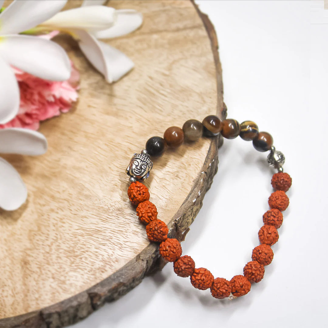 Pulsera de armonía espiritual Mokshya: ojo de tigre, rudraksha y símbolo de Buda
